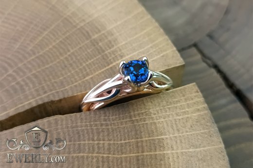 Женское кольцо из золота с сапфиром, фото