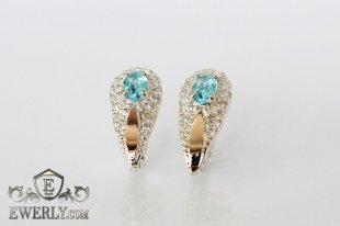 Серебряные серьги - капли с золотом и светло-голубыми камнями, фото