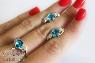 Серёжки и кольцо из серебра с голубыми камнями, фото