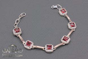 Женский браслет с красными камнями, фото