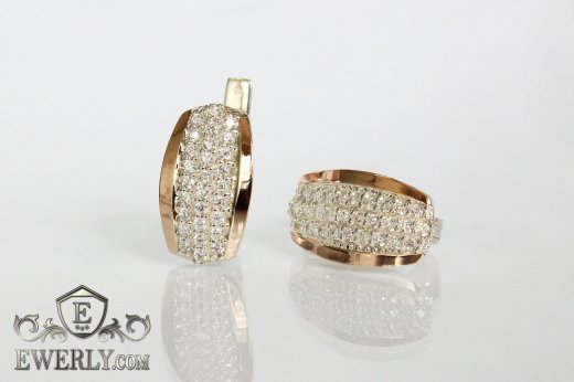 Женские серёжки с золотыми вставками и белыми камнями, фото